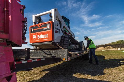 hauling a compact track loader and skid steer|skid steer trailers.